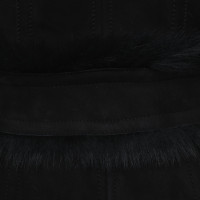 Burberry Jacke/Mantel aus Pelz in Schwarz