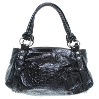 Coccinelle Patent leather handbag in black