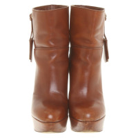 Louis Vuitton Ankle boots Leather in Brown