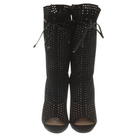 Christian Louboutin Boots with hole pattern