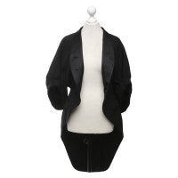 Givenchy Jacke/Mantel aus Wolle in Schwarz