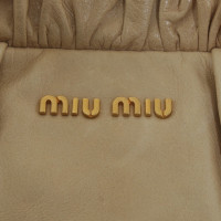 Miu Miu Shoppers in licht beige