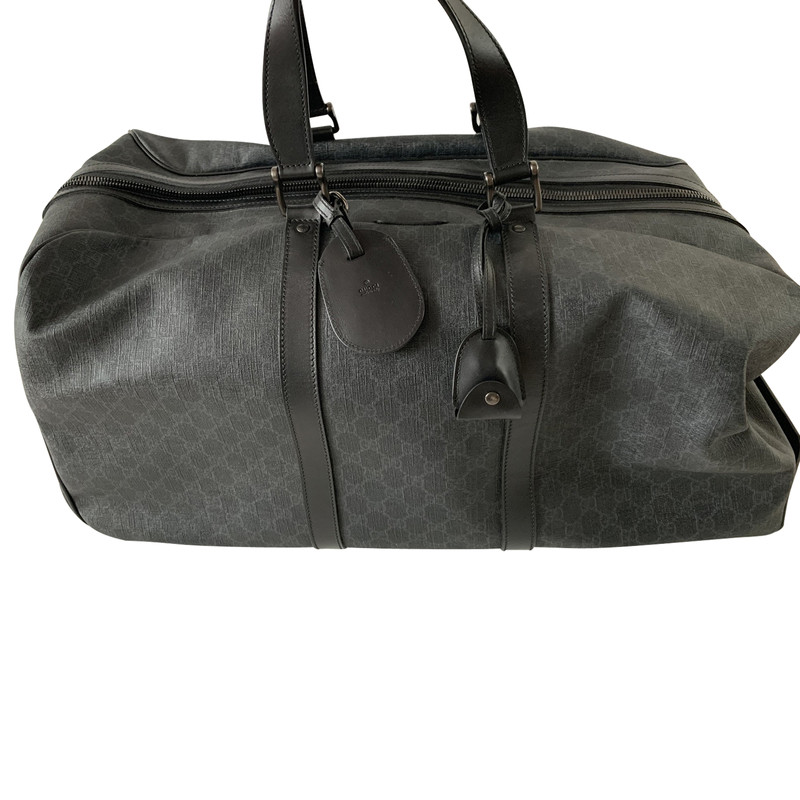 black gucci travel bag