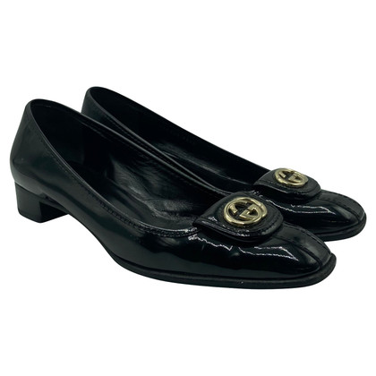 Gucci Pumps/Peeptoes Patent leather in Black