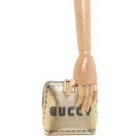 Gucci Umhängetasche aus Leder in Gold