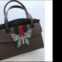 Gucci Handtasche aus Leder in Braun