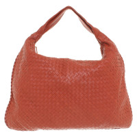 Bottega Veneta "Maxi Veneta Bag" in rust red