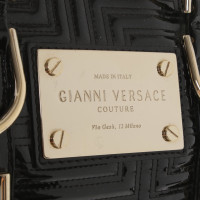 Versace Handbag in black / gold