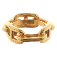 Hermès Gold colored cloth ring