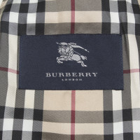 Burberry Jacke/Mantel aus Baumwolle in Gelb