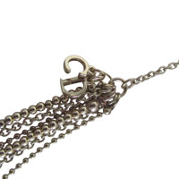 Christian Dior Asymmetrical chain.
