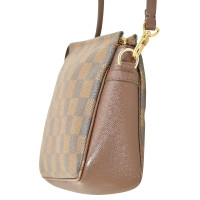 Louis Vuitton Troussee aus Leder in Braun