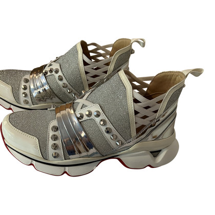 Christian Louboutin Sneakers aus Leder in Silbern