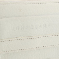 Longchamp Täschchen/Portemonnaie aus Leder in Creme