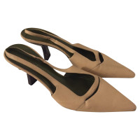 Gucci Pumps/Peeptoes aus Leder in Beige