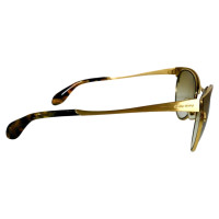 Miu Miu Sunglasses in Gold