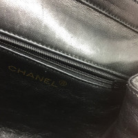 Chanel Vintage black leather carrying case with pompoms
