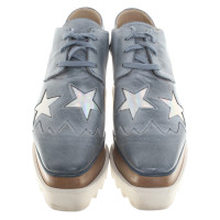 Stella McCartney Lace-up shoes with star applications