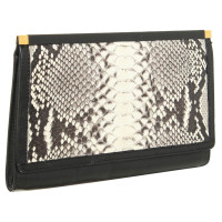 Kaviar Gauche clutch in black with Python leather details