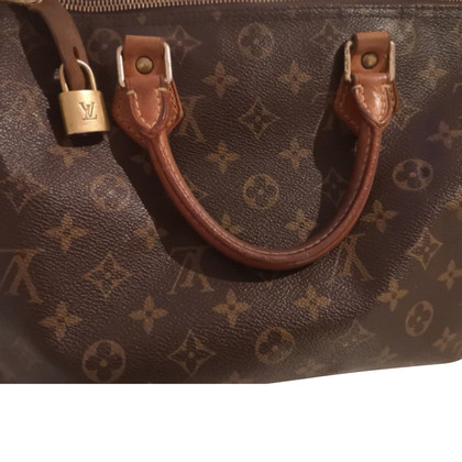 Louis Vuitton Handbag Canvas in Brown