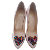 Christian Louboutin pumps with heart application