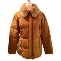 Salvatore Ferragamo Quilted jacket with fur collar