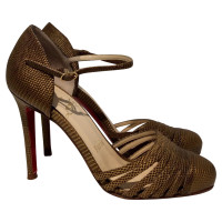 Christian Louboutin pumps in golden brown