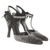 Yves Saint Laurent Pumps/Peeptoes aus Leder in Schwarz