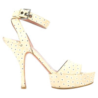 Alaïa Sandals Leather in Yellow