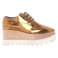 Stella McCartney Gold lace-up shoes