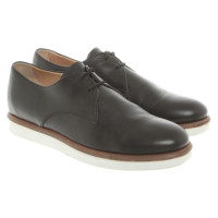 Tod's Chaussures à lacets en Cuir en Noir