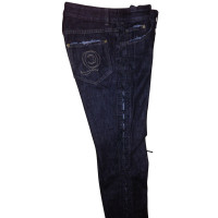 Alexander McQueen Jeans avec bande de cuir sur les côtés 
