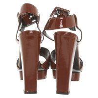 Hermès Sandals Patent leather in Brown