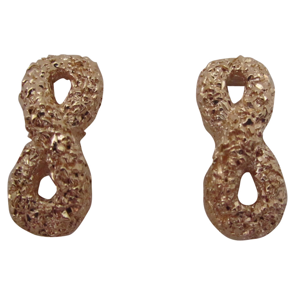 Nina Ricci ear clips