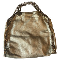 Stella McCartney Handtasche aus Leder in Gold