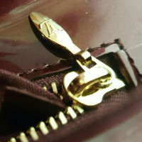 Louis Vuitton clutch lakleer