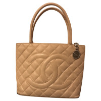 Chanel Medallion Leer in Beige