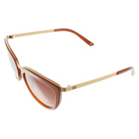 Escada Sunglasses in Gold / Brown