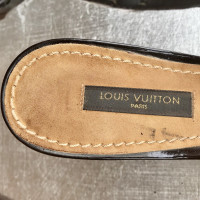 Louis Vuitton Sandalen in zwart en beige leer