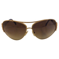 Prada Sunglasses in Gold