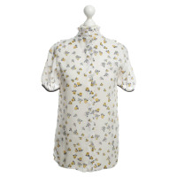 Baum Und Pferdgarten Blouse avec un motif floral