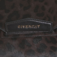 Givenchy clutch con il modello leopardo