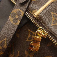 Louis Vuitton Jacke/Mantel aus Leder in Braun