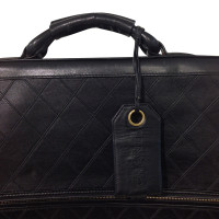 Chanel  sac de vêtement en cuir noir