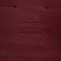 Louis Vuitton clutch with monogram pattern