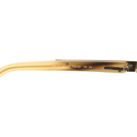 Miu Miu Sunglasses in Gold