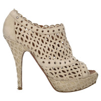 Alaïa Sandales en Cuir en Beige