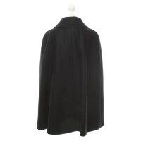 Saint Laurent Jacke/Mantel aus Wolle in Schwarz