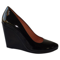 Robert Clergerie Wedges aus Lackleder in Schwarz