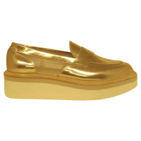 Baldinini Schnürschuhe aus Leder in Gold